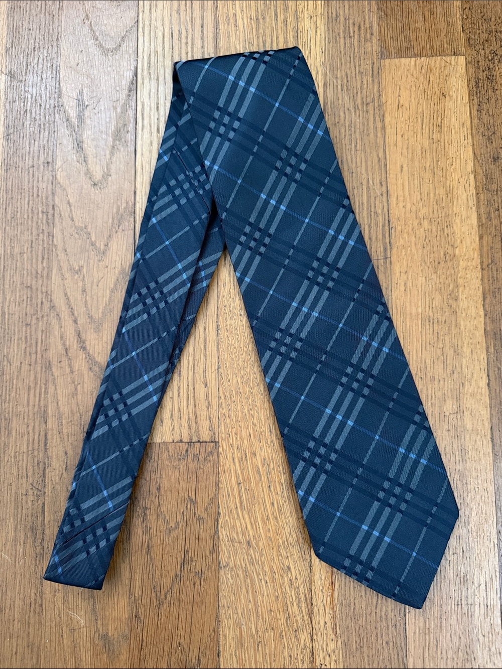 Burberry black/gray/blue plaid silk tie.